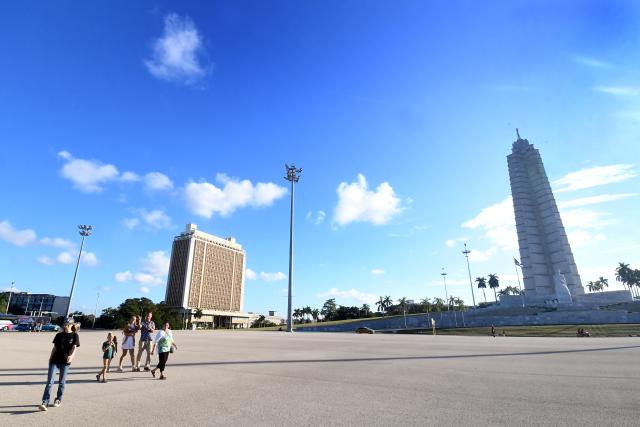 (260112) -- HAVANA, Jan. 12, 2026 (Xinhua) -- People walk past the monument of Jose Marti (R), in Havana, capital of Cuba, on Jan. 11, 2026. Cuban President Miguel Diaz-Canel on Sunday said Cuba is a free, independent and sovereign nation, rejecting U.S. President Donald Trump's accusations that the island country provided "security services" to Venezuela in exchange for oil. (Photo by Joaquin Hernandez/Xinhua)