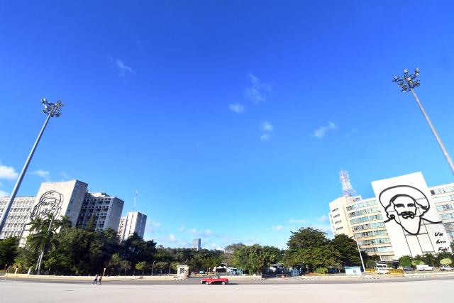 (260112) -- HAVANA, Jan. 12, 2026 (Xinhua) -- A vintage car drives across the Plaza de la Revolucion, in Havana, capital of Cuba, on Jan. 11, 2026. Cuban President Miguel Diaz-Canel on Sunday said Cuba is a free, independent and sovereign nation, rejecting U.S. President Donald Trump's accusations that the island country provided "security services" to Venezuela in exchange for oil. (Photo by Joaquin Hernandez/Xinhua)