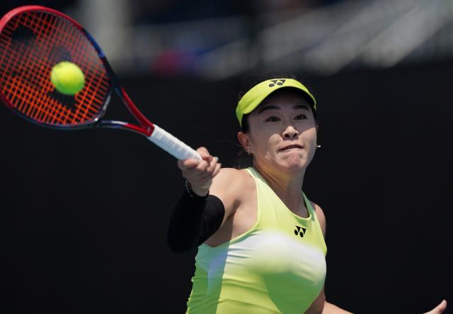 (260112) -- MELBOURNE, Jan. 12, 2026 (Xinhua) -- Zhu Lin of China hits a return during the women's singles qualifying 1st round match against Laura Pigossi of Brazil at Australian Open tennis tournament in Melbourne, Australia, Jan. 12, 2026. (Xinhua/Wang Shen)