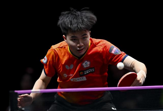 (260112) -- DOHA, Jan. 12, 2026 (Xinhua) -- Lin Yun-Ju of Chinese Taipei hits a return during the men's singles final match against Jang Woojin of South Korea at the WTT Champions Doha 2026 in Doha, Qatar, Jan. 11, 2026. (Photo by Nikku/Xinhua)