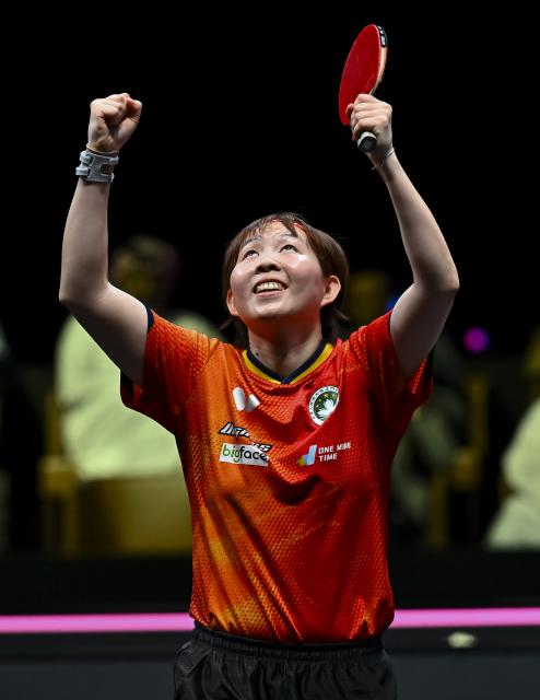 (260112) -- DOHA, Jan. 12, 2026 (Xinhua) -- Zhu Yuling of China's Macao celebrates after winning the women's singles final match against Chen Xingtong of China at the WTT Champions Doha 2026 in Doha, Qatar, on Jan. 11, 2026. (Photo by Nikku/Xinhua)