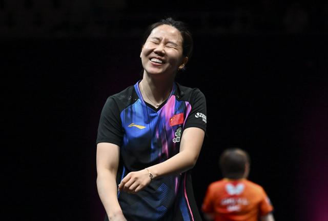 (260112) -- DOHA, Jan. 12, 2026 (Xinhua) -- Chen Xingtong of China reacts during the women's singles final match against Zhu Yuling of China at the WTT Champions Doha 2026 in Doha, Qatar, on Jan. 11, 2026. (Photo by Nikku/Xinhua)