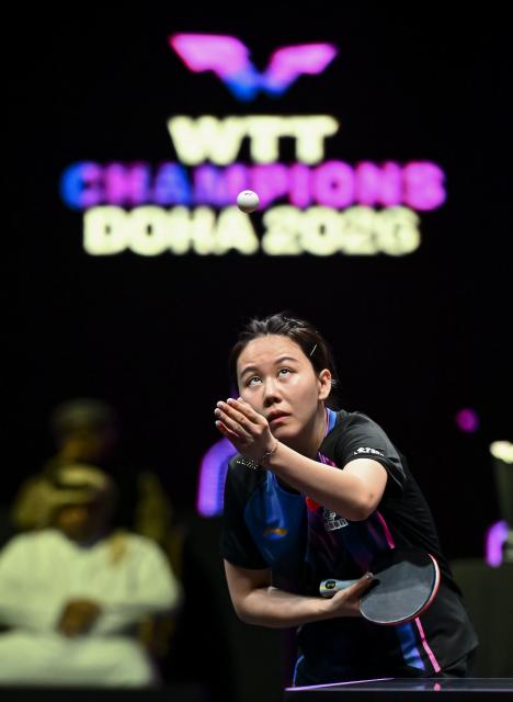 (260112) -- DOHA, Jan. 12, 2026 (Xinhua) -- Chen Xingtong of China serves during the women's singles final match against Zhu Yuling of China's Macao at the WTT Champions Doha 2026 in Doha, Qatar, on Jan. 11, 2026. (Photo by Nikku/Xinhua)