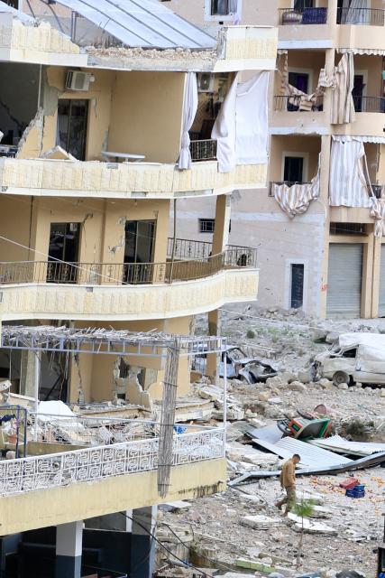 (260112) -- KFAR HATTA, Jan. 12, 2026 (Xinhua) -- This photo taken on Jan. 12, 2026 shows residential buildings and vehicles destroyed in Israeli airstrikes in Kfar Hatta, southern Lebanon. The Israeli forces carried out on Sunday afternoon airstrikes on the village of Kfar Hatta in southern Lebanon's Litani River area, Lebanon's official National News Agency (NNA) reported.
   A Lebanese security source told Xinhua that Israeli warplanes carried out more than 35 airstrikes in three waves, firing around 70 missiles at Hezbollah positions and residential buildings in Kfar Hatta. The strikes caused extensive destruction, damaging dozens of homes. (Photo by Ali Hashisho/Xinhua)