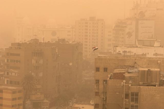 (260112) -- CAIRO, Jan. 12, 2026 (Xinhua) -- Buildings are shrouded in sand and dust during a sandstorm in Cairo, Egypt, Jan. 12, 2026. (Xinhua/Ahmed Gomaa)