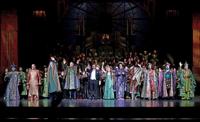 (260113) -- CHONGQING, Jan. 13, 2026 (Xinhua) -- The cast and crew of the opera Turandot acknowledges the audience after the performance at the Chongqing Grand Theatre in southwest China's Chongqing, Jan. 10, 2026. TO GO WITH "Feature: Opera Turandot deepens cultural exchange between China and Italy" (Xinhua)