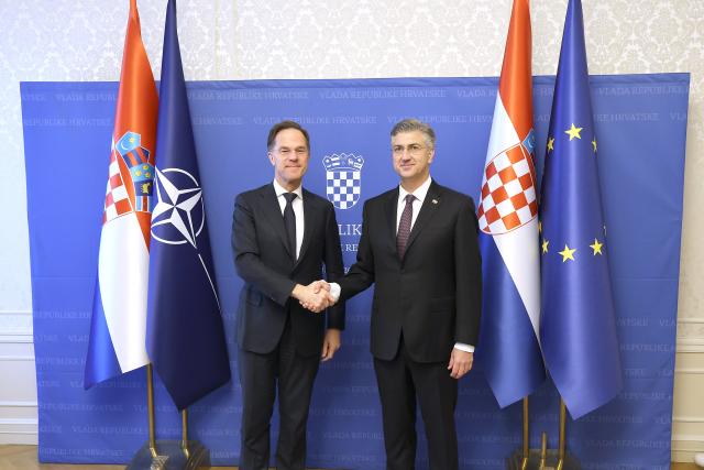 (260113) -- ZAGREB, Jan. 13, 2026 (Xinhua) -- Croatian Prime Minister Andrej Plenkovic (R) meets with visiting North Atlantic Treaty Organization (NATO) Secretary General Mark Rutte in Zagreb, Croatia, Jan. 12, 2026. No Croatian troops will be sent to Ukraine, Plenkovic reiterated at a joint press conference with Rutte on Monday. (Patrik Macek/PIXSELL via Xinhua)