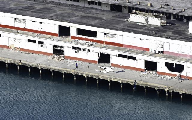 (260113) -- BEIJING, Jan. 13, 2026 (Xinhua) -- This photo taken on Jan. 11, 2026 shows damage caused by U.S. airstrike at the port of La Guaira, Venezuela. U.S. forces carried out military strikes in Caracas and three other Venezuelan cities on Jan. 3, an operation that led to the seizure of Maduro and his wife Cilia Flores. The strikes have drawn worldwide condemnation and concern. (Xinhua/Ding Hongfa)