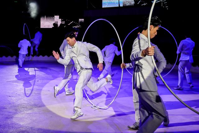 (260113) -- BUDAPEST, Jan. 13, 2026 (Xinhua) -- Members of the China National Acrobatic Troupe perform a hoop-diving act during the gala show of the 16th Budapest International Circus Festival in Budapest, Hungary, Jan. 12, 2026. The China National Acrobatic Troupe claimed the Grand Prix at the Budapest International Circus Festival. (Photo by David Balogh/Xinhua)