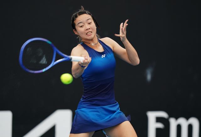 (260113) -- MELBOURNE, Jan. 13, 2026 (Xinhua) -- Ma Yexin of China hits a return during the women's singles qualifying 1st round match against Varvara Lepchenko of the United States at Australian Open tennis tournament in Melbourne, Australia, Jan. 13, 2026. (Photo by Wang Shen/Xinhua)
