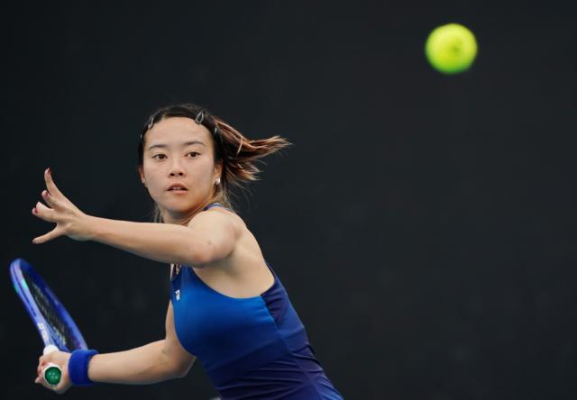(260113) -- MELBOURNE, Jan. 13, 2026 (Xinhua) -- Ma Yexin of China hits a return during the women's singles qualifying 1st round match against Varvara Lepchenko of the United States at Australian Open tennis tournament in Melbourne, Australia, Jan. 13, 2026. (Photo by Wang Shen/Xinhua)