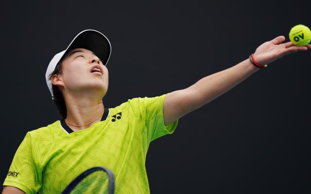(260113) -- MELBOURNE, Jan. 13, 2026 (Xinhua) -- Bai Zhuoxuan of China serves during the women's singles qualifying 1st round match against Alina Korneeva of Russia at Australian Open tennis tournament in Melbourne, Australia, Jan. 13, 2026. (Photo by Wang Shen/Xinhua)
