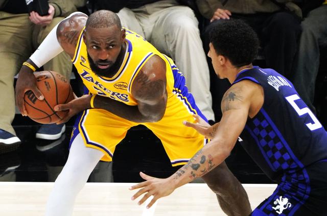 (260113) -- SACRAMENTO, Jan. 13, 2026 (Xinhua) -- Los Angeles Lakers' LeBron James (L) competes during the 2025-2026 NBA regular season game between Sacramento Kings and Los Angeles Lakers in Sacramento, the United States, on Jan. 12, 2026. (Xinhua/Wu Xiaoling)