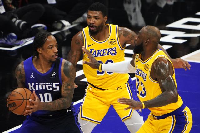 (260113) -- SACRAMENTO, Jan. 13, 2026 (Xinhua) -- Sacramento Kings' DeMar DeRozan (L) competes during the 2025-2026 NBA regular season game between Sacramento Kings and Los Angeles Lakers in Sacramento, the United States, on Jan. 12, 2026. (Xinhua/Wu Xiaoling)