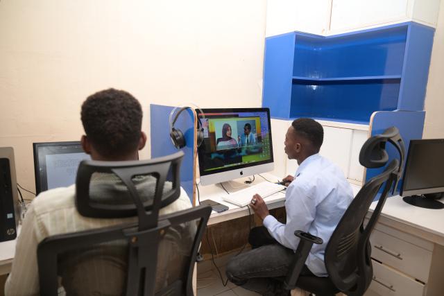 (260113) -- MOGADISHU, Jan. 13, 2026 (Xinhua) -- This photo taken on Jan. 12, 2026 shows editorial staff members working at the Somali National Television in Mogadishu, Somalia. The Somali National Television resumed its broadcasting in 2011 after a two-decade break off due to the civil war. Nowadays, it is on air around the clock for audiences both at home and abroad. (Xinhua/Yang Guang)