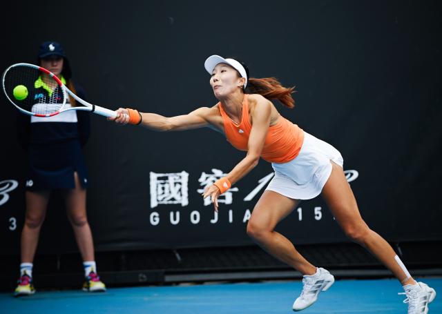 (260113) -- MELBOURNE, Jan. 13, 2026 (Xinhua) -- Gao Xinyu of China hits a return during the women's singles qualifying 1st round match against Lilli Tagger of Austria at Australian Open tennis tournament in Melbourne, Australia, Jan. 13, 2026. (Photo by Wang Shen/Xinhua)