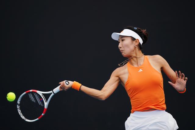 (260113) -- MELBOURNE, Jan. 13, 2026 (Xinhua) -- Gao Xinyu of China hits a return during the women's singles qualifying 1st round match against Lilli Tagger of Austria at Australian Open tennis tournament in Melbourne, Australia, Jan. 13, 2026. (Photo by Wang Shen/Xinhua)