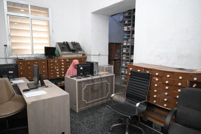 (260113) -- MOGADISHU, Jan. 13, 2026 (Xinhua) -- This photo taken on Jan. 12, 2026 shows a staff member working in the archives of Radio Mogadishu in Mogadishu, Somalia. Radio Mogadishu, established in 1951, is one of the official state-run broadcasting organizations in Somalia. The archives of Radio Mogadishu houses a large number of historical audio files, including music, poetry, interviews, political speeches and other contents, which record the social and cultural process of Somalia in recent decades. (Xinhua/Yang Guang)