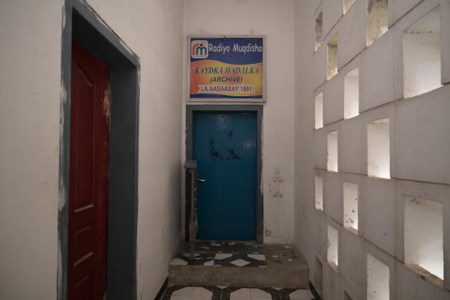 (260113) -- MOGADISHU, Jan. 13, 2026 (Xinhua) -- This photo taken on Jan. 12, 2026 shows a door to the archives of Radio Mogadishu in Mogadishu, Somalia. Radio Mogadishu, established in 1951, is one of the official state-run broadcasting organizations in Somalia. The archives of Radio Mogadishu houses a large number of historical audio files, including music, poetry, interviews, political speeches and other contents, which record the social and cultural process of Somalia in recent decades. (Xinhua/Yang Guang)