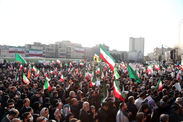 (260113) -- TEHRAN, Jan. 13, 2026 (Xinhua) -- People take part in a demonstration in Tehran, Iran, on Jan. 12, 2026. Tens of thousands of pro-government citizens took to the streets across Iran on Monday, responding to calls from Iranian authorities to demonstrate solidarity. (Xinhua/Shadati)