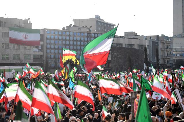 (260113) -- TEHRAN, Jan. 13, 2026 (Xinhua) -- People take part in a demonstration in Tehran, Iran, on Jan. 12, 2026. Tens of thousands of pro-government citizens took to the streets across Iran on Monday, responding to calls from Iranian authorities to demonstrate solidarity. (Xinhua/Shadati)