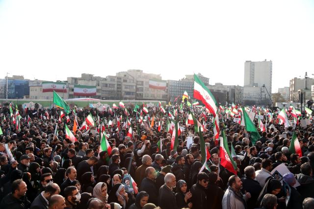 (260113) -- TEHRAN, Jan. 13, 2026 (Xinhua) -- People take part in a demonstration in Tehran, Iran, on Jan. 12, 2026. Tens of thousands of pro-government citizens took to the streets across Iran on Monday, responding to calls from Iranian authorities to demonstrate solidarity. (Xinhua/Shadati)