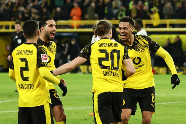 (260114) -- DORTMUND, Jan. 14, 2026 (Xinhua) -- Players of Borussia Dortmund celebrate scoring during the German first division Bundesliga football match between Borussia Dortmund and SV Werder Bremen in Dortmund, Germany, Jan. 13, 2026. (Photo by Joachim Bywaletz/Xinhua)