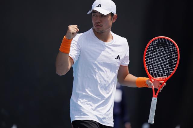 (260114) -- MELBOURNE, Jan. 14, 2026 (Xinhua) -- Wu Yibing of China celebrates during the men's singles qualifying 2nd round match against Nicolas Mejia of Columbia at Australian Open tennis tournament in Melbourne, Australia, Jan. 14, 2026. (Photo by Wang Shen/Xinhua)