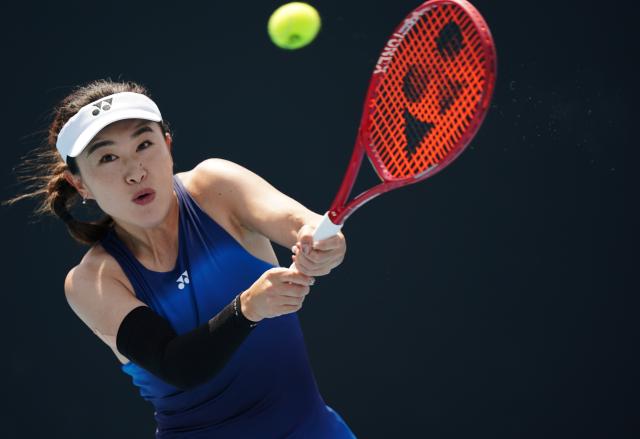(260114) -- MELBOURNE, Jan. 14, 2026 (Xinhua) -- Zhu Lin of China hits a return during the women's singles qualifying 2nd round match against Victoria Jimenez Kasintseva of Andorra at Australian Open tennis tournament in Melbourne, Australia, Jan. 14, 2026. (Photo by Wang Shen/Xinhua)