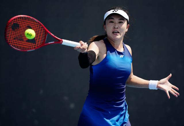 (260114) -- MELBOURNE, Jan. 14, 2026 (Xinhua) -- Zhu Lin of China hits a return during the women's singles qualifying 2nd round match against Victoria Jimenez Kasintseva of Andorra at Australian Open tennis tournament in Melbourne, Australia, Jan. 14, 2026. (Photo by Wang Shen/Xinhua)