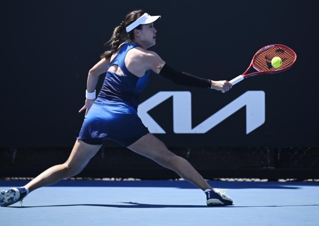 (260114) -- MELBOURNE, Jan. 14, 2026 (Xinhua) -- Zhu Lin of China hits a return during the women's singles qualifying 2nd round match against Victoria Jimenez Kasintseva of Andorra at Australian Open tennis tournament in Melbourne, Australia, Jan. 14, 2026. (Photo by Wang Shen/Xinhua)