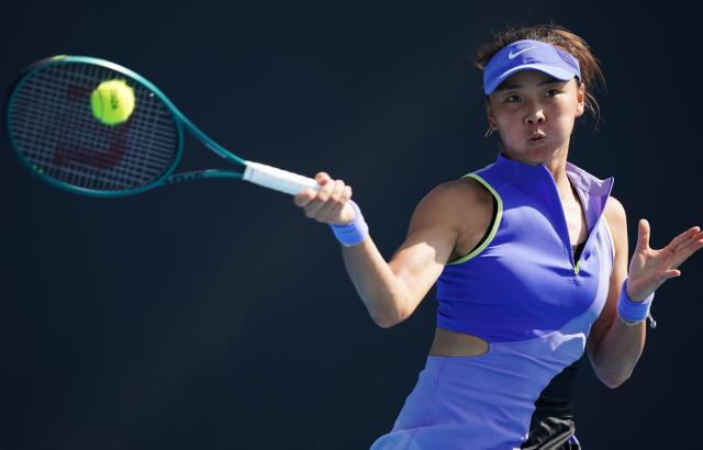 (260114) -- MELBOURNE, Jan. 14, 2026 (Xinhua) -- Yuan Yue of China hits a return during the women's singles qualifying 2nd round match against Maria Lourdes Carle of Argentina at Australian Open tennis tournament in Melbourne, Australia, Jan. 14, 2026. (Photo by Wang Shen/Xinhua)