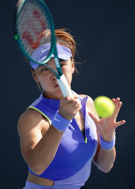 (260114) -- MELBOURNE, Jan. 14, 2026 (Xinhua) -- Yuan Yue of China hits a return during the women's singles qualifying 2nd round match against Maria Lourdes Carle of Argentina at Australian Open tennis tournament in Melbourne, Australia, Jan. 14, 2026. (Photo by Wang Shen/Xinhua)