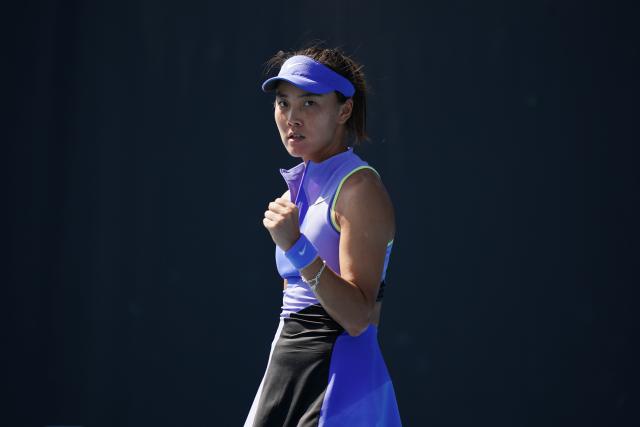 (260114) -- MELBOURNE, Jan. 14, 2026 (Xinhua) -- Yuan Yue of China celebrates during the women's singles qualifying 2nd round match against Maria Lourdes Carle of Argentina at Australian Open tennis tournament in Melbourne, Australia, Jan. 14, 2026. (Photo by Wang Shen/Xinhua)