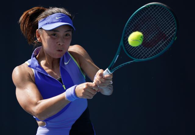 (260114) -- MELBOURNE, Jan. 14, 2026 (Xinhua) -- Yuan Yue of China hits a return during the women's singles qualifying 2nd round match against Maria Lourdes Carle of Argentina at Australian Open tennis tournament in Melbourne, Australia, Jan. 14, 2026. (Photo by Wang Shen/Xinhua)