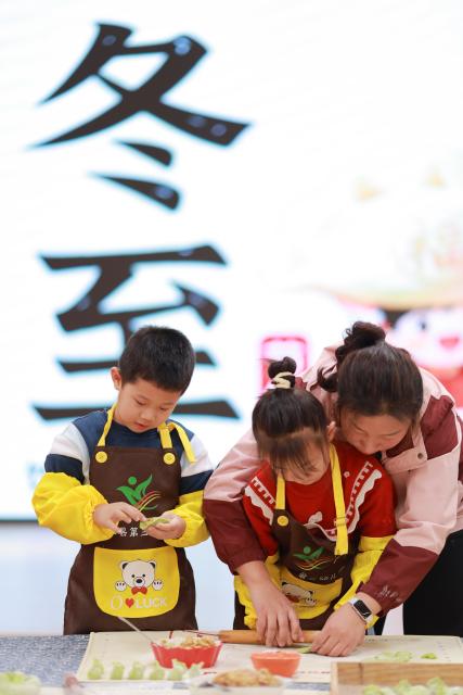 (260114) -- BEIJING, Jan. 14, 2026 (Xinhua) -- This photo taken on Dec. 19, 2025 shows children learning to make dumplings in the guidance of a teacher at a kindergarten in Neiqiu County, Xingtai City of north China's Hebei Province.
  China enters its coldest season in the eleventh month of the Chinese lunar calendar. 
  Urbanization and modern agriculture have weakened the impact of solar terms on daily life, but cultural and dietary habits have been passed down from generation to generation. (Photo by Liu Jidong/Xinhua)