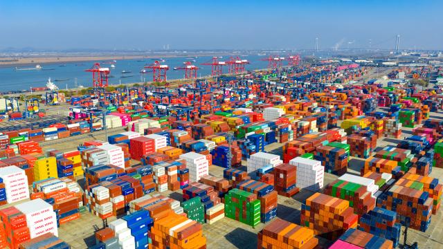 (260114) -- BEIJING, Jan. 14, 2026 (Xinhua) -- An aerial drone photo taken on Dec. 14, 2025 shows a view of the Longtan Container Terminal at Nanjing Port, east China's Jiangsu Province. Last year, China's foreign trade value hit 45.47 trillion yuan (about 6.48 trillion U.S. dollars), up 3.8 percent year on year, according to data released by the General Administration of Customs on Wednesday. This marks the ninth consecutive year of growth for China's foreign trade since 2017. (Photo by Yang Suping/Xinhua)