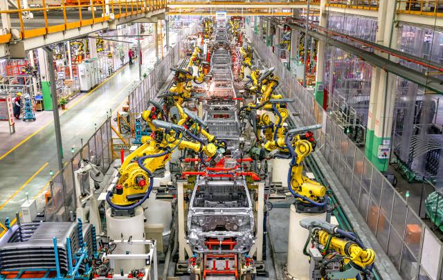 (260114) -- BEIJING, Jan. 14, 2026 (Xinhua) -- This photo taken on May 13, 2025 shows a view of a production line at the workshop of a vehicle company in Jiangdu District of Yangzhou City, east China's Jiangsu Province. China's automobile production and sales both exceeded 34 million units last year, setting a new record high, industry data showed on Wednesday.
   New energy vehicles (NEVs) accelerated their growth momentum, with production and sales totaling 16.626 million and 16.49 million units, respectively, marking respective year-on-year increases of 29 percent and 28.2 percent, and maintaining the top position in the world for 11 straight years, the China Association of Automobile Manufacturers confirmed. (Photo by Ren Fei/Xinhua)