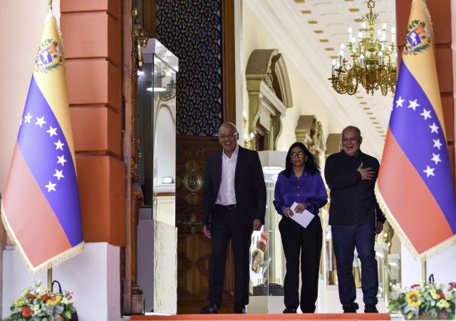 (260114) -- CARACAS, Jan. 14, 2026 (Xinhua) -- Venezuela's acting president Delcy Rodriguez (C), National Assembly President Jorge Rodriguez (1st L) and Interior Minister Diosdado Cabello arrive to attend a press conference in Caracas, Venezuela, Jan. 14, 2026. (Xinhua/Ding Hongfa)