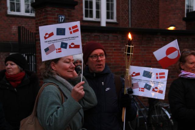 (260114) -- COPENHAGEN, Jan. 14, 2026 (Xinhua) -- People participate in a protest against U.S. plans on Greenland in Copenhagen, Denmark, Jan. 14, 2026. About 200 protesters rallied outside the U.S. Embassy in Denmark Wednesday, expressing opposition to Washington's plans on Greenland as Danish and Greenlandic officials met with U.S. Vice President JD Vance and Secretary of State Marco Rubio in Washington. (Photo by Liu Zhichao/Xinhua)