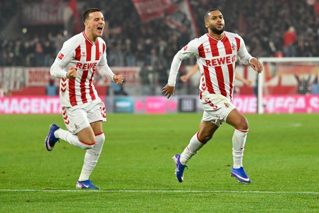 (260115) -- COLOGNE, Jan. 15, 2026 (Xinhua) -- Linton Maina (R) of FC Cologne celebrates scoring with teammate Said El Mala during the German first division Bundesliga football match between FC Cologne and FC Bayern Munich in Cologne, Germany, Jan. 14, 2026. (Photo by Ulrich Hufnagel/Xinhua)