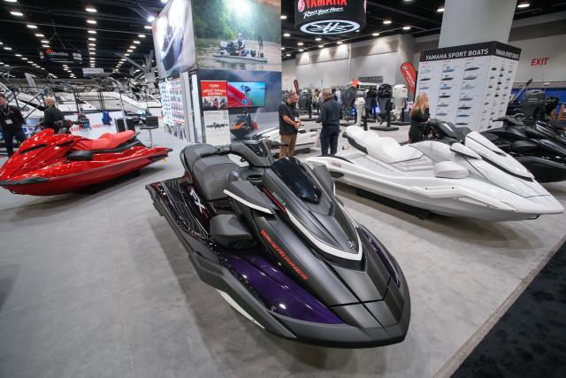 (260115) -- VANCOUVER, Jan. 15, 2026 (Xinhua) -- People view personal watercraft during the Vancouver International Boat Show 2026 at the Vancouver Convention Centre in Vancouver, British Columbia, Canada, Jan. 14, 2026. The five-day show kicked off here on Wednesday, with hundreds of exhibitors from around the world showcasing the latest vessels, marine gears and marine technology. (Photo by Liang Sen/Xinhua)