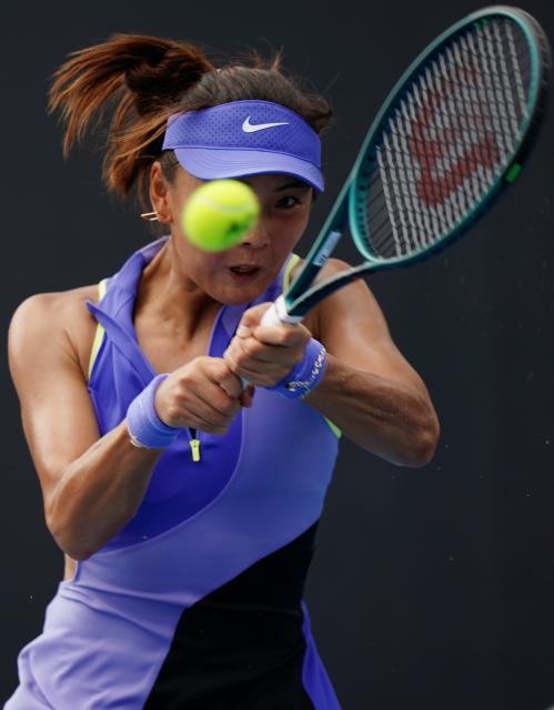 (260115) -- MELBOURNE, Jan. 15, 2026 (Xinhua) -- Yuan Yue of China hits a return during the women's singles qualifying final round match against Tamara Zidansek of Slovenia at Australian Open tennis tournament in Melbourne, Australia, Jan. 15, 2026. (Photo by Wang Shen/Xinhua)