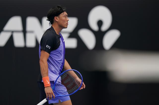 (260115) -- MELBOURNE, Jan. 15, 2026 (Xinhua) -- Coleman Wong of China's Hong Kong reacts during the men's singles qualifying final round match against Elias Ymer of Sweden at Australian Open tennis tournament in Melbourne, Australia, Jan. 15, 2026. (Photo by Wang Shen/Xinhua)