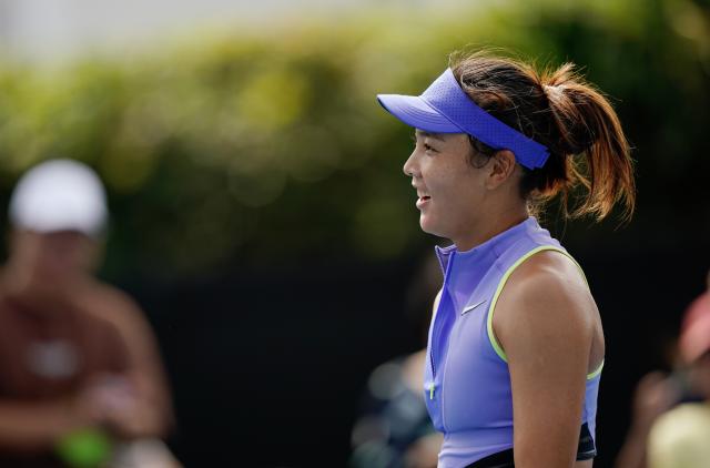 (260115) -- MELBOURNE, Jan. 15, 2026 (Xinhua) -- Yuan Yue of China reacts during the women's singles qualifying final round match against Tamara Zidansek of Slovenia at Australian Open tennis tournament in Melbourne, Australia, Jan. 15, 2026. (Photo by Wang Shen/Xinhua)