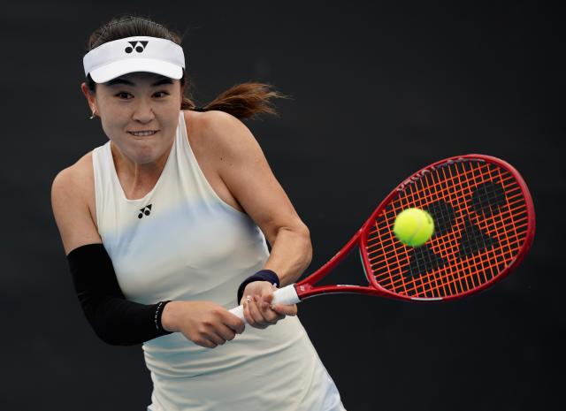 (260115) -- MELBOURNE, Jan. 15, 2026 (Xinhua) -- Zhu Lin of China hits a return during the women's singles qualifying final round match against Marina Stakusic of Canada at Australian Open tennis tournament in Melbourne, Australia, Jan. 15, 2026. (Photo by Wang Shen/Xinhua)