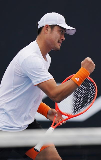 (260115) -- MELBOURNE, Jan. 15, 2026 (Xinhua) -- Wu Yibing of China celebrates victory after the men's singles qualifying final round match against Tristan Boyer of the United States at Australian Open tennis tournament in Melbourne, Australia, Jan. 15, 2026. (Photo by Wang Shen/Xinhua)