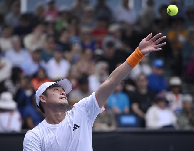 (260115) -- MELBOURNE, Jan. 15, 2026 (Xinhua) -- Wu Yibing of China serves during the men's singles qualifying final round match against Tristan Boyer of the United States at Australian Open tennis tournament in Melbourne, Australia, Jan. 15, 2026. (Photo by Wang Shen/Xinhua)