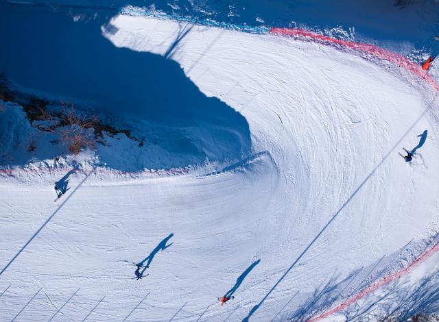 (260115) -- ALMATY, Jan. 15, 2026 (Xinhua) -- An aerial drone photo taken on Jan. 13, 2026 shows skiers skiing at a ski resort in Almaty, Kazakhstan. In winter, people of Almaty go outdoor to enjoy the fun of ice and snow sports. (Xinhua/Li Renzi)