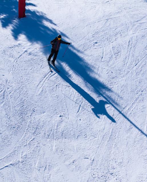 (260115) -- ALMATY, Jan. 15, 2026 (Xinhua) -- A drone photo taken on Jan. 13, 2026 shows a skier skiing at a ski resort in Almaty, Kazakhstan. In winter, people of Almaty go outdoor to enjoy the fun of ice and snow sports. (Xinhua/Li Renzi)